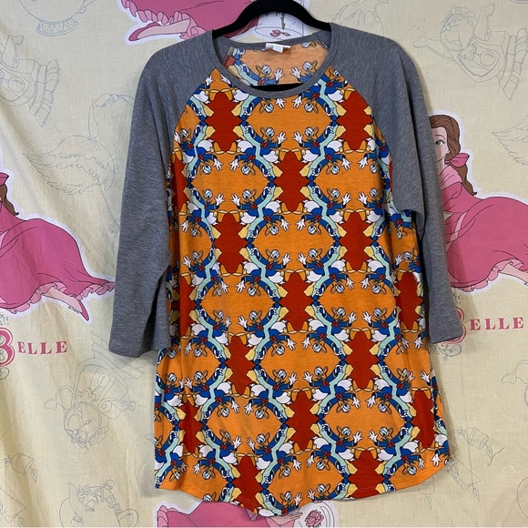 LuLaRoe Tops - LuLaRoe Disney Donald Duck Print Raglan Top Tee